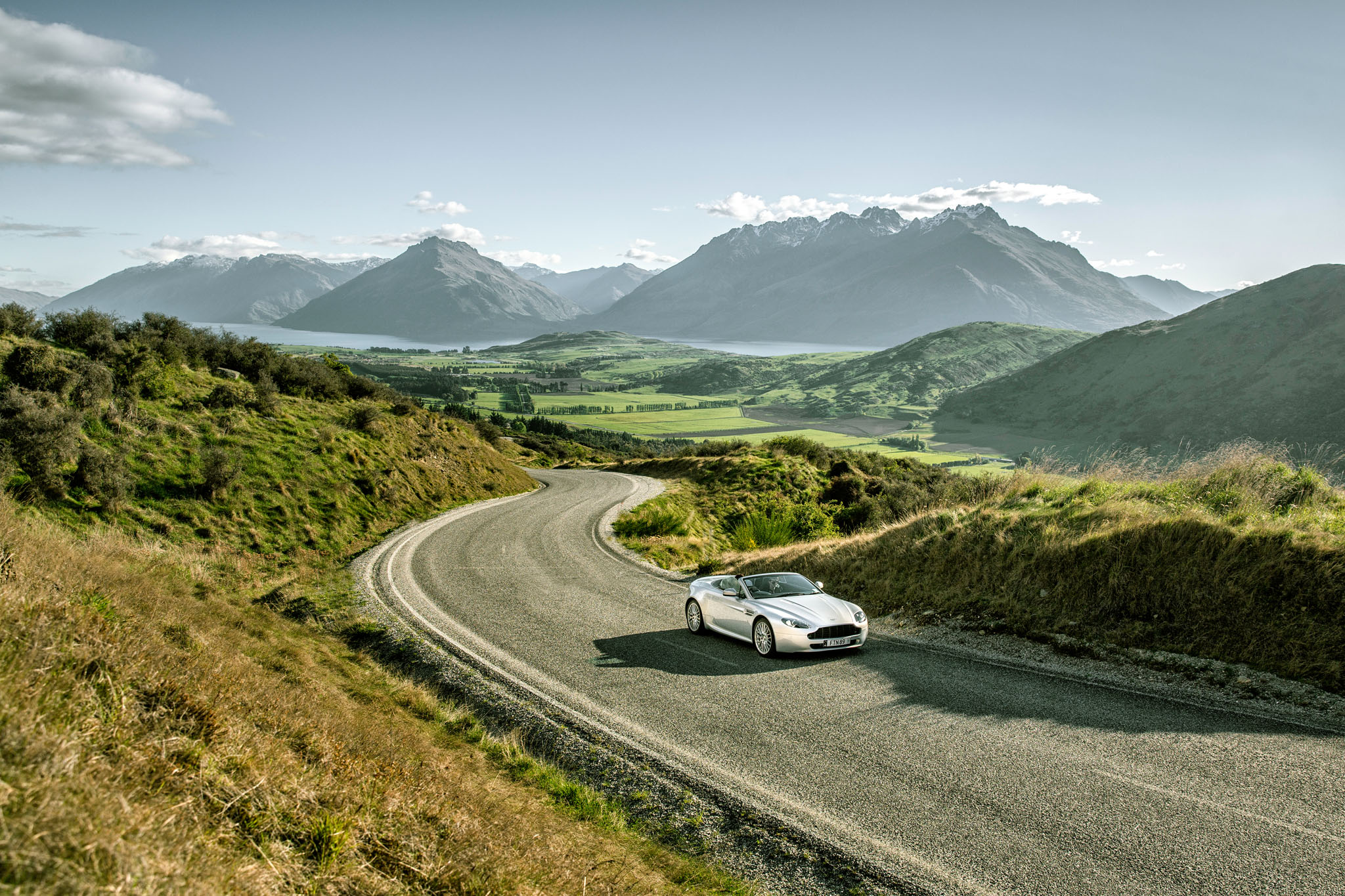 Car Photography in Queenstown, New Zealand, Aston Martin on mountain road in Queenstown New Zealand