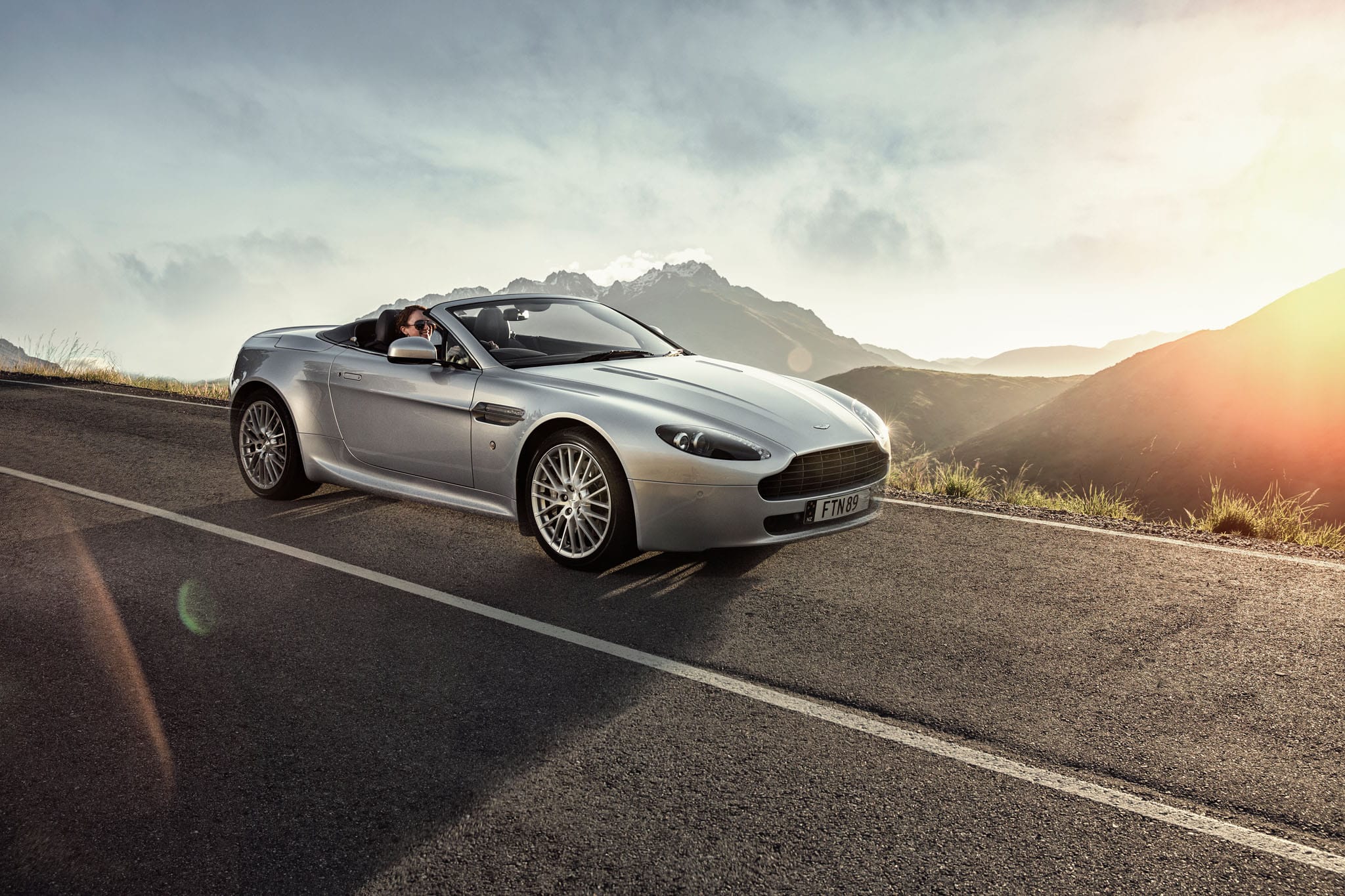 Car Photography in Queenstown, New Zealand. Aston Martin on mountain road in Queenstown New Zealand